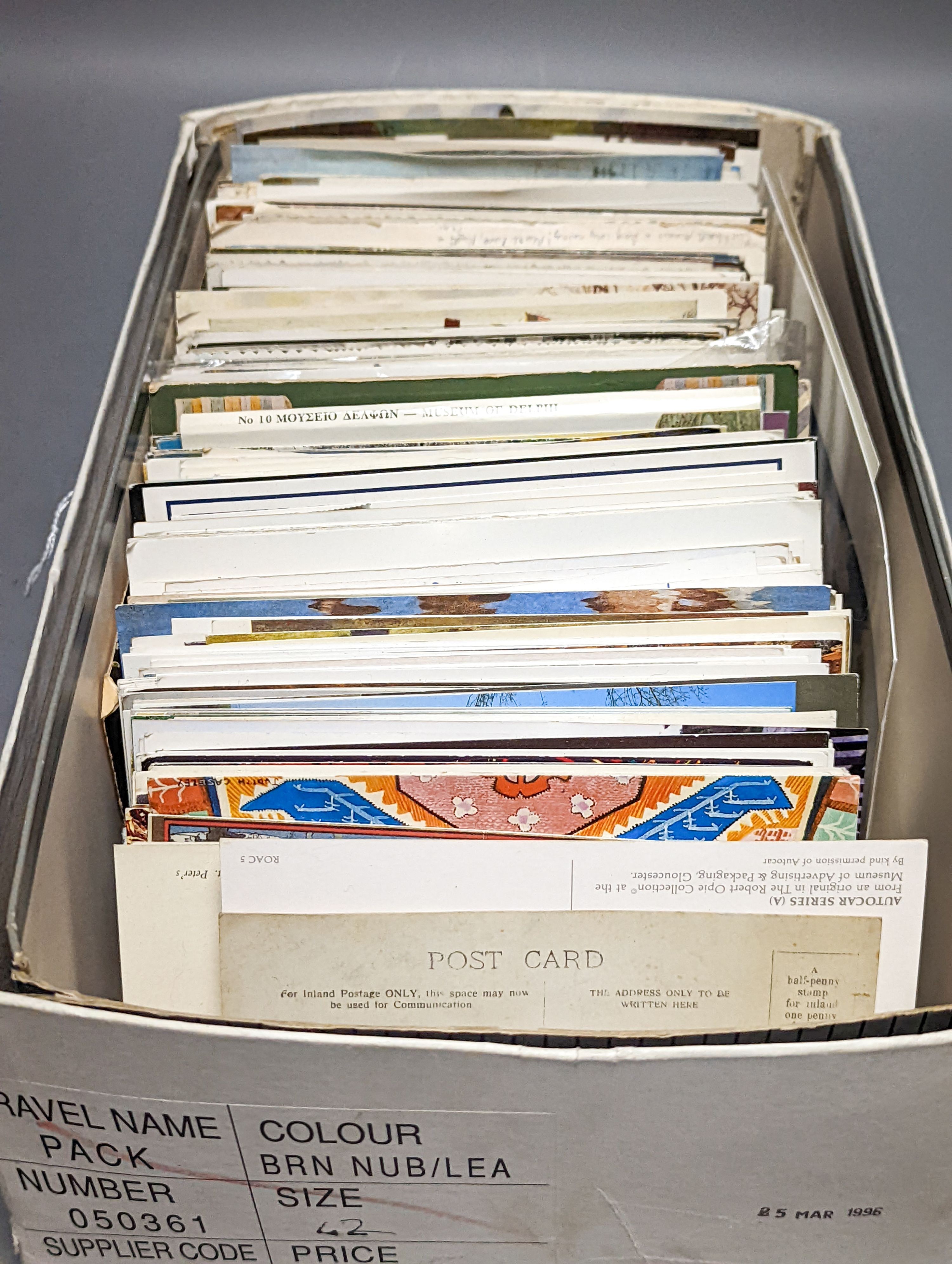 Two early 20th century postcard albums, a photo album and a collection of loose postcards